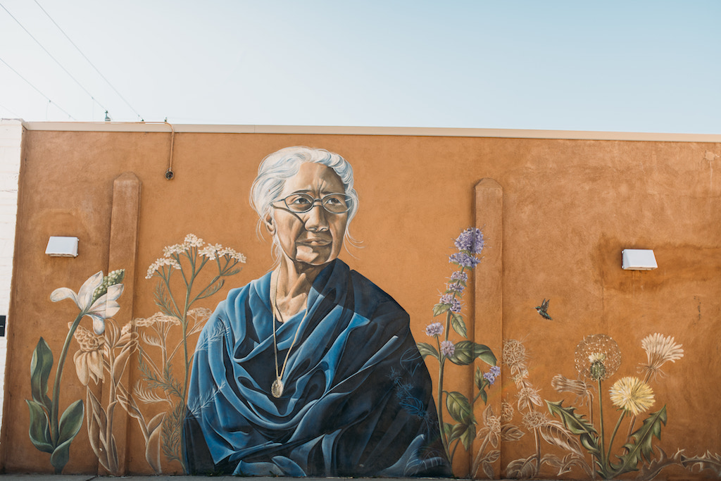 Maclovia Sanchez de Zamora by Nani Chacon. Painted mural of a elderly lady