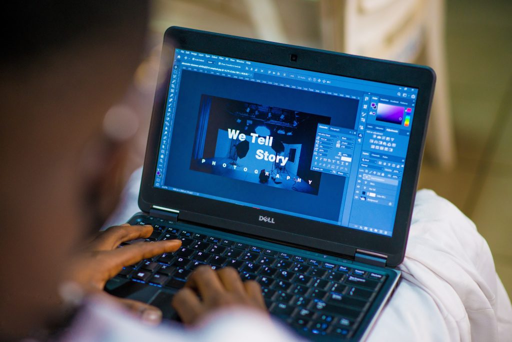 A man on his laptop working on a design concept.